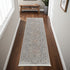 7' X 10' Silver Taupe and Blue Oriental Power Loom Worn Faded Area Rug With Fringe